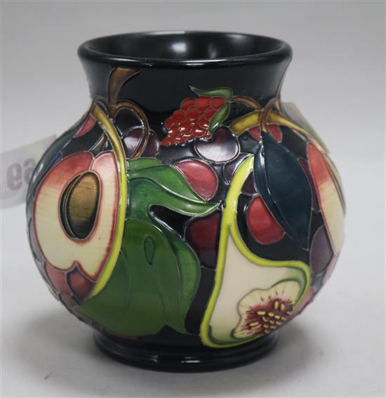 A modern Moorcroft black ground vase